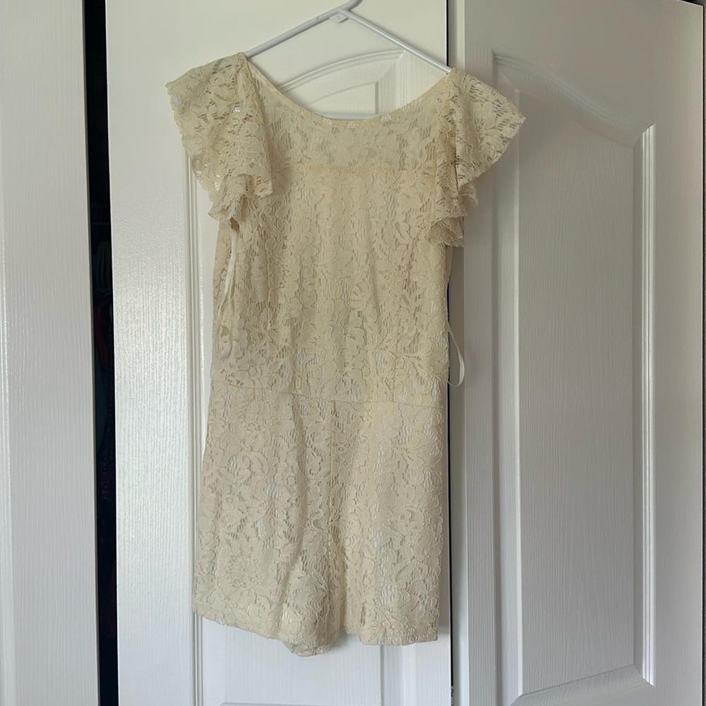 Never worn and NWT white lace romper